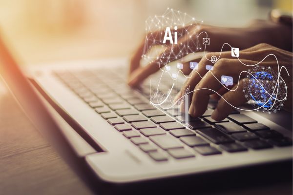 Person on computer experiencing productivity gains due to successful Agentforce implementation.